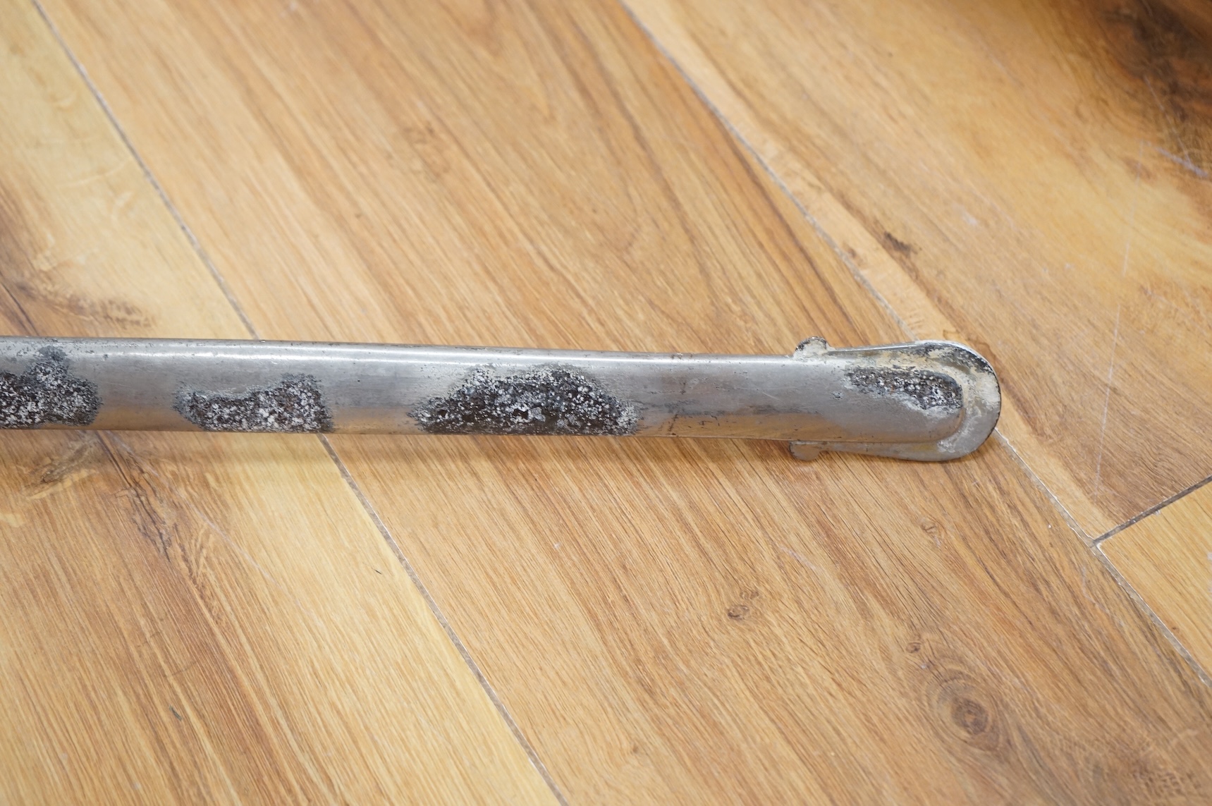 A Victorian 1845 pattern infantry officer’s levee sword, with slender blade etched; Hamburger Rogers & Co., and crowned VR and foliage, regulation pierced brass guard with folding side guard, wire bound fish skin covered